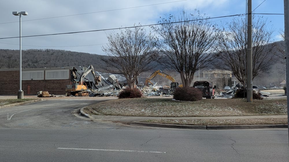 Demolition crews work to clear the site of the former CVS Pharmacy on Cecil Ashburn Drive on February 20, 2025.